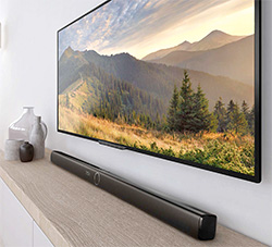 Photo d'une barre de son place devant une TV - crdit : Philips